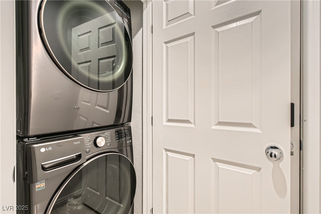 4602 Ingleton Circle Las Vegas, NV 89115 - Photo 5 of 11 Washroom featuring stacked washing maching and dry