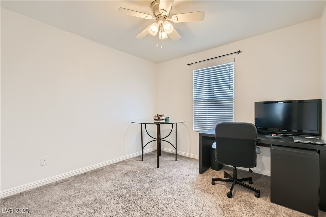 4602 Ingleton Circle Las Vegas, NV 89115 - Photo 6 of 11 Carpeted home office with baseboards and a ceiling