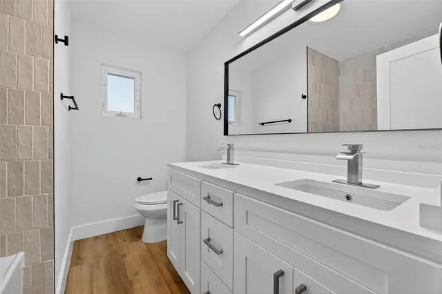 a bathroom with a sink and a toilet