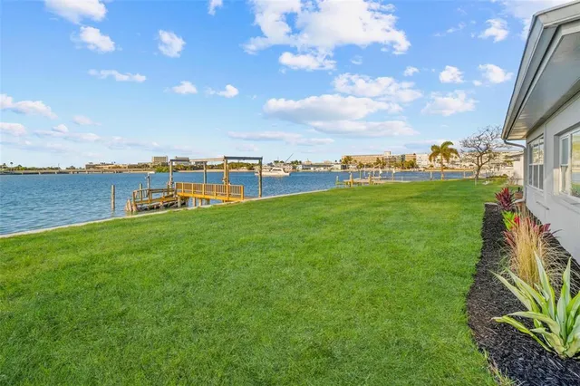 a view of a garden with houses