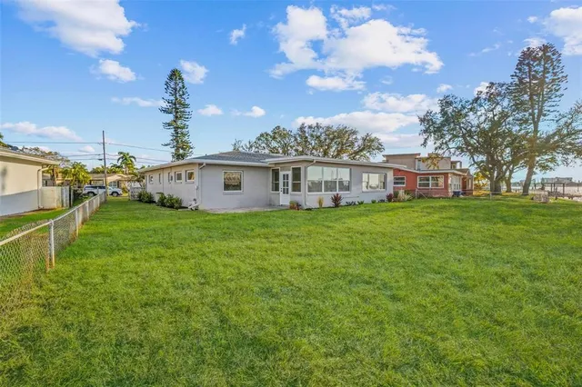a view of a house with a big yard
