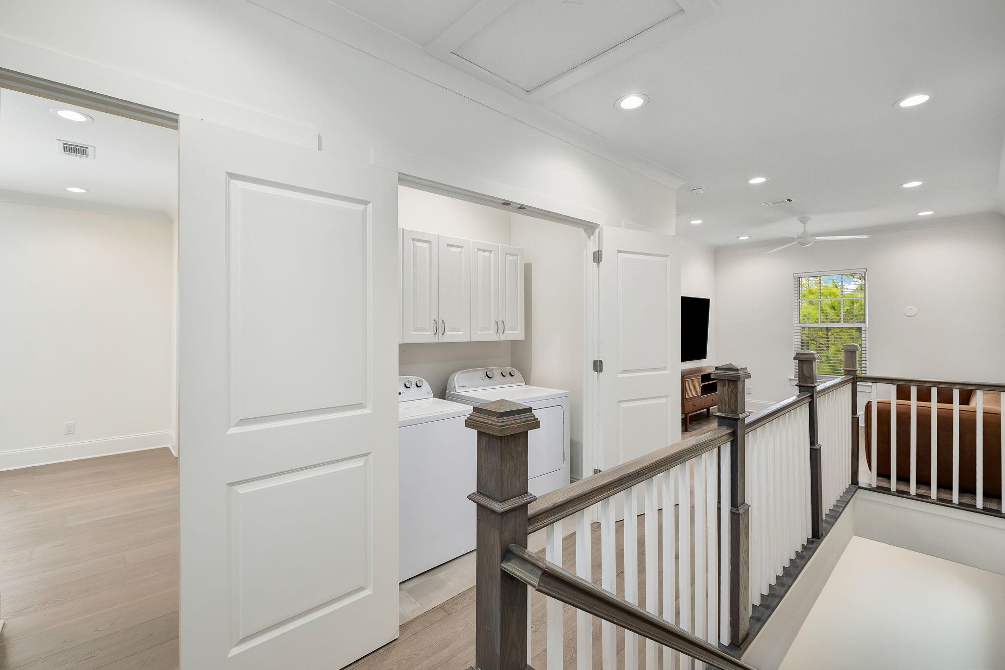 74 Heron's Crossing Santa Rosa Beach, FL 32459 - Photo 15 of 41 a view of a kitchen with a sink and a refrigerator
