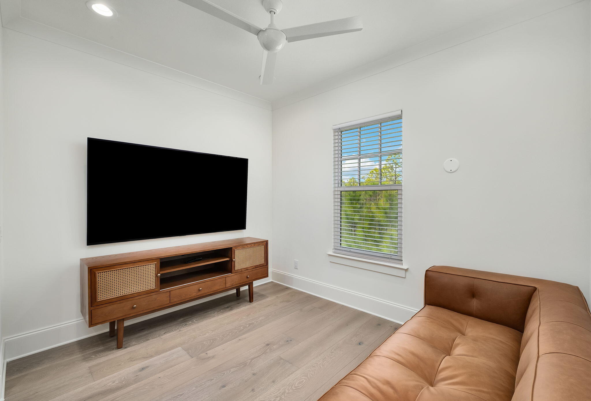 74 Heron's Crossing Santa Rosa Beach, FL 32459 - Photo 16 of 41 a living room with furniture and a flat screen tv