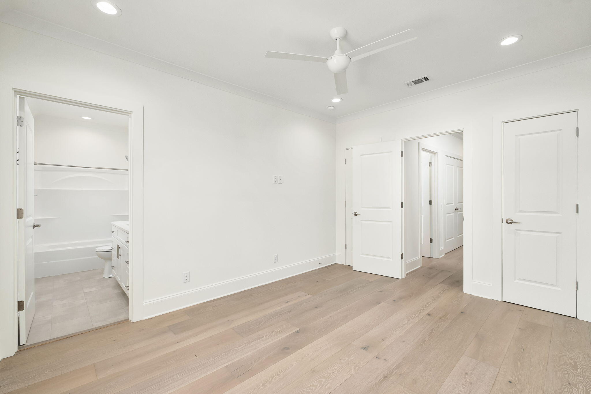 74 Heron's Crossing Santa Rosa Beach, FL 32459 - Photo 23 of 41 an empty room with wooden floor