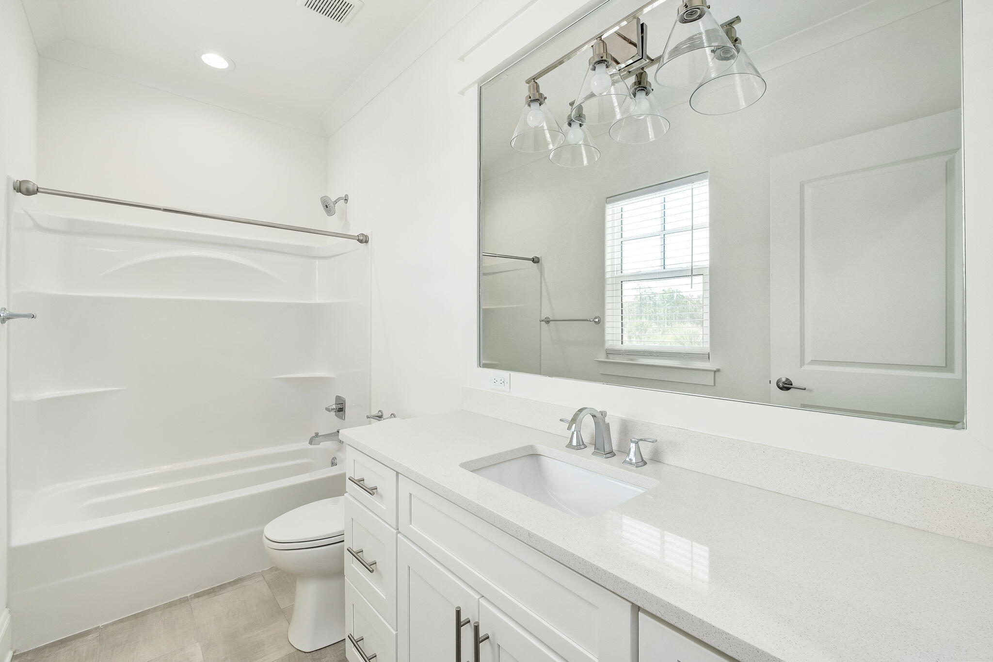 74 Heron's Crossing Santa Rosa Beach, FL 32459 - Photo 24 of 41 a bathroom with a granite countertop sink a toilet and shower