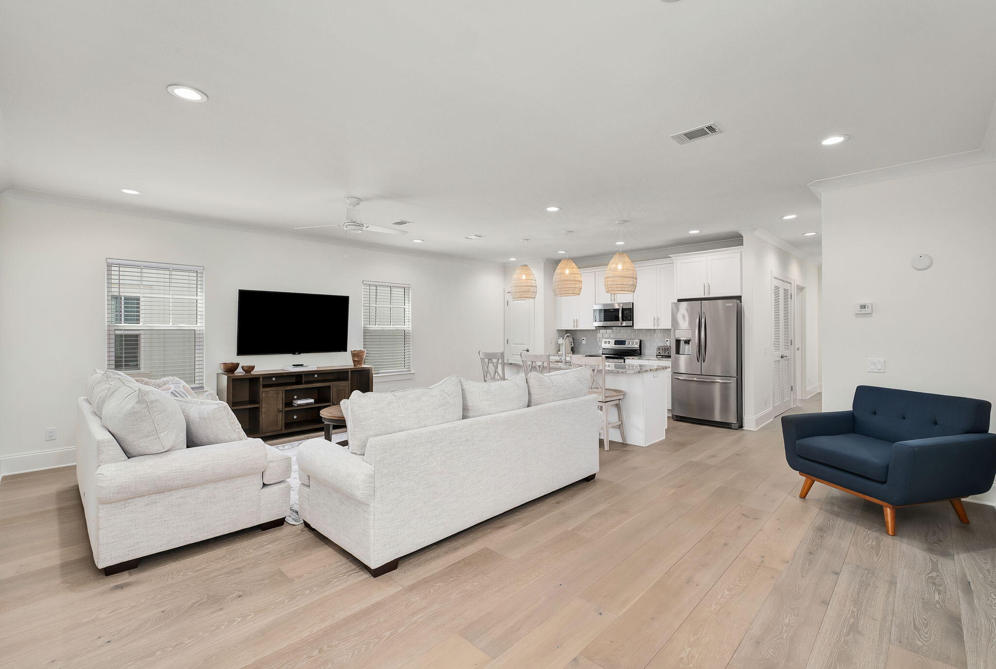 74 Heron's Crossing Santa Rosa Beach, FL 32459 - Photo 4 of 41 a living room with furniture and a flat screen tv