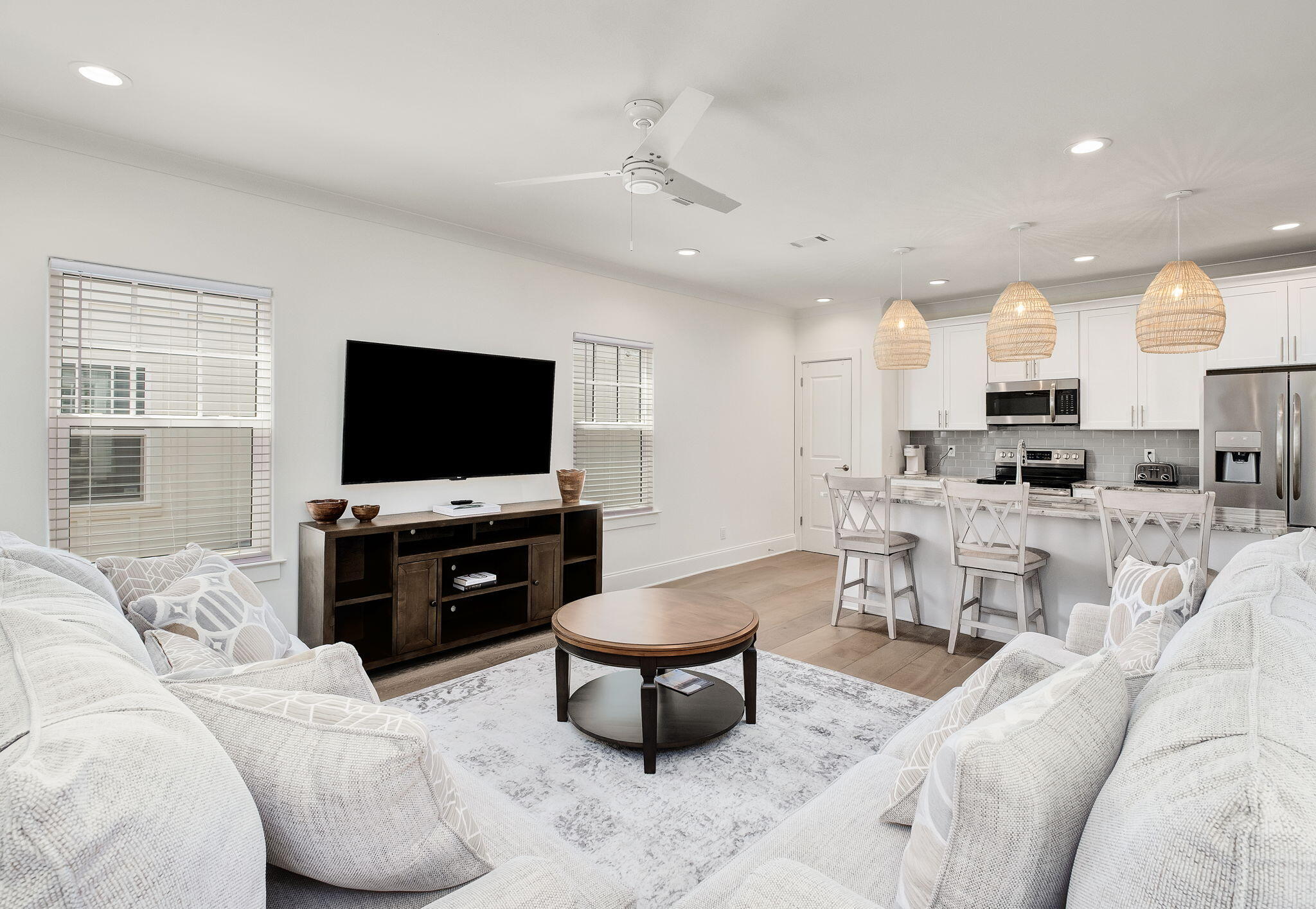 74 Heron's Crossing Santa Rosa Beach, FL 32459 - Photo 5 of 41 a living room with furniture and a flat screen tv