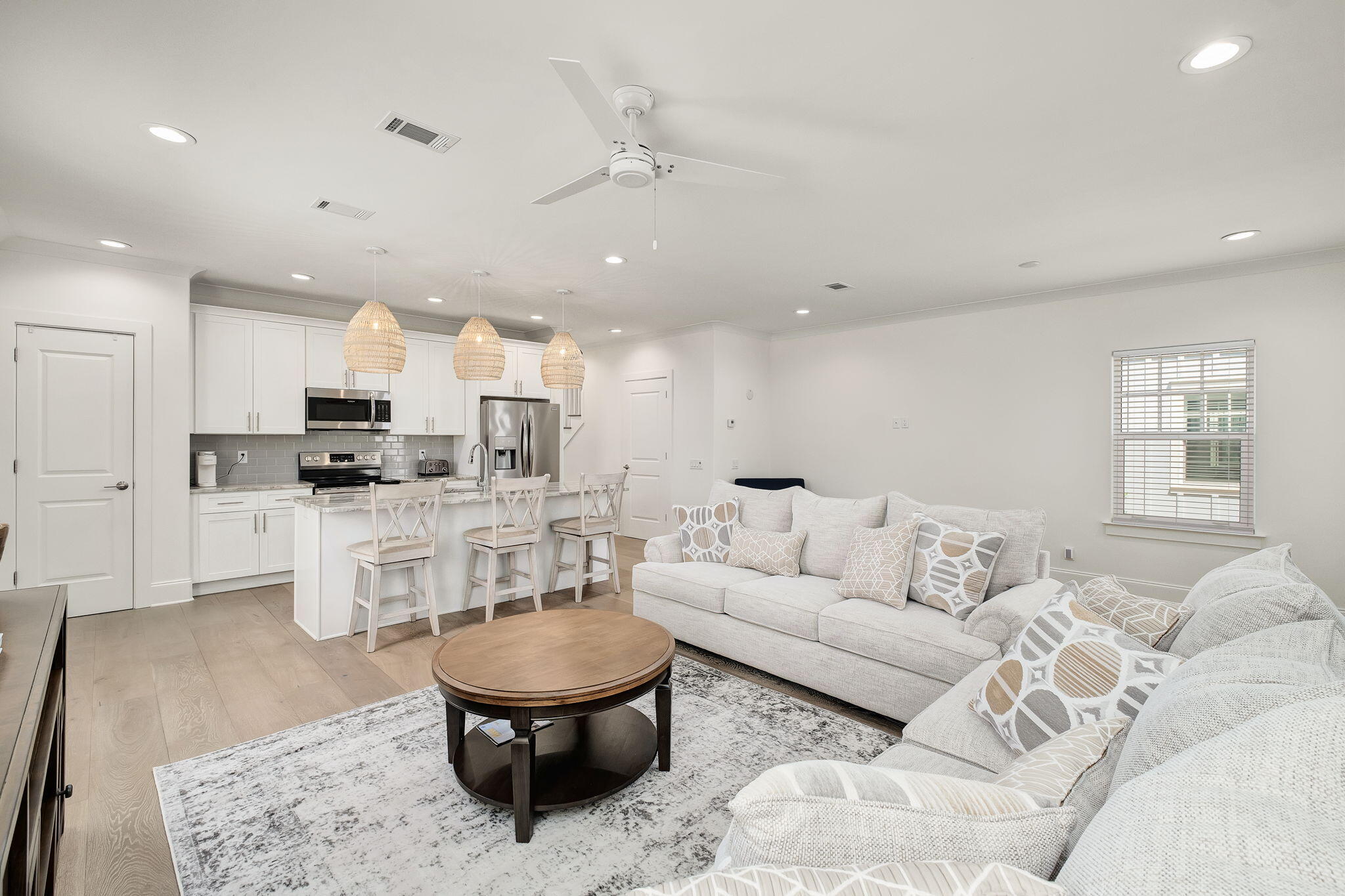 74 Heron's Crossing Santa Rosa Beach, FL 32459 - Photo 6 of 41 a living room with furniture and a view of kitchen