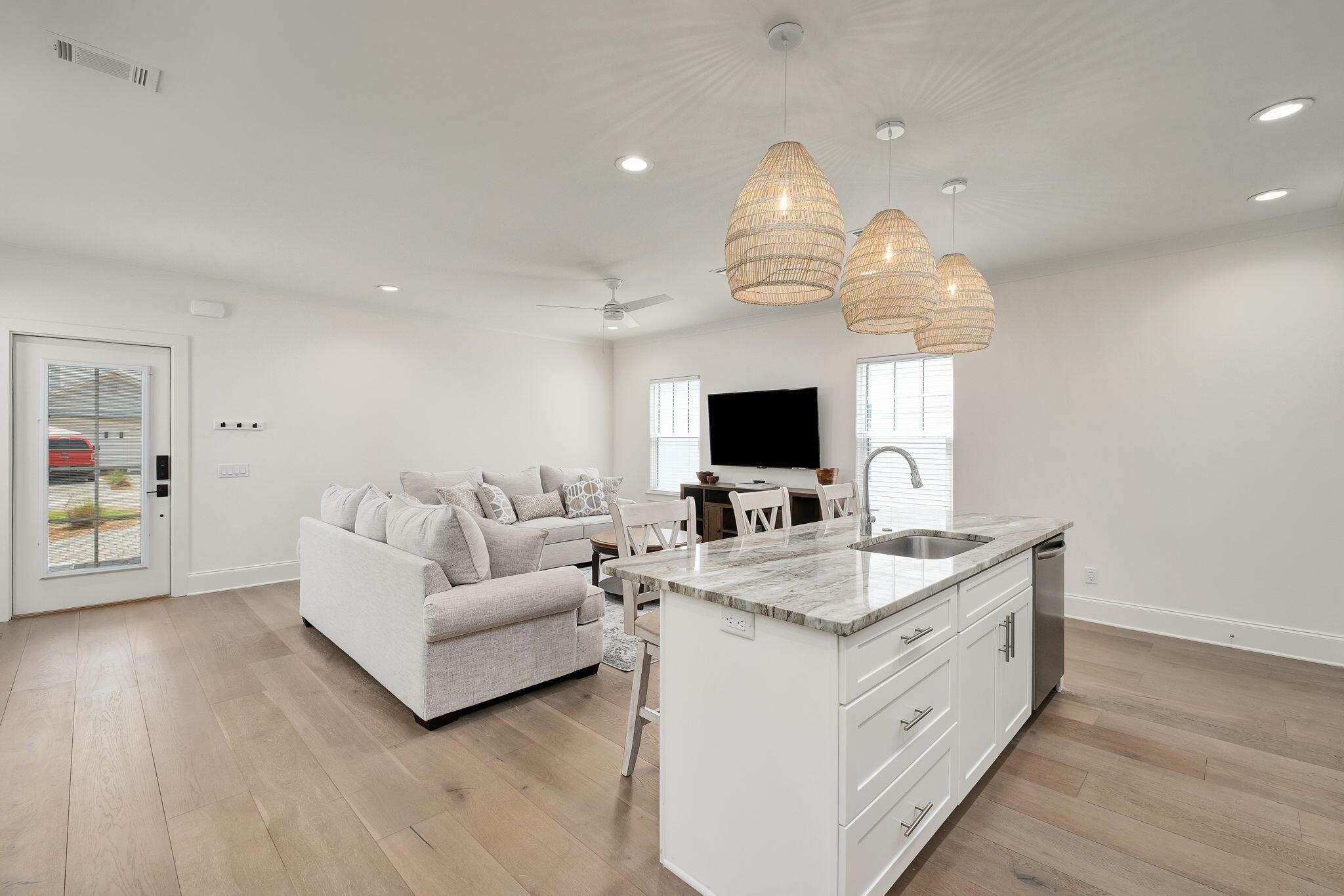 74 Heron's Crossing Santa Rosa Beach, FL 32459 - Photo 9 of 41 a living room with furniture and a flat screen tv