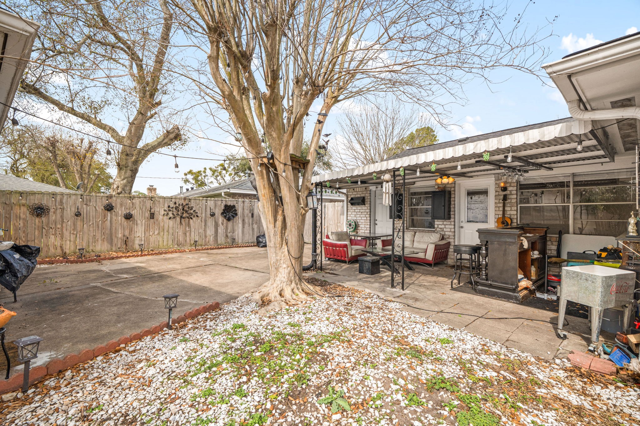 9019 Grape Street Houston, TX 77036 - Photo 23 of 24 a view of a outdoor space with a patio and sitting area