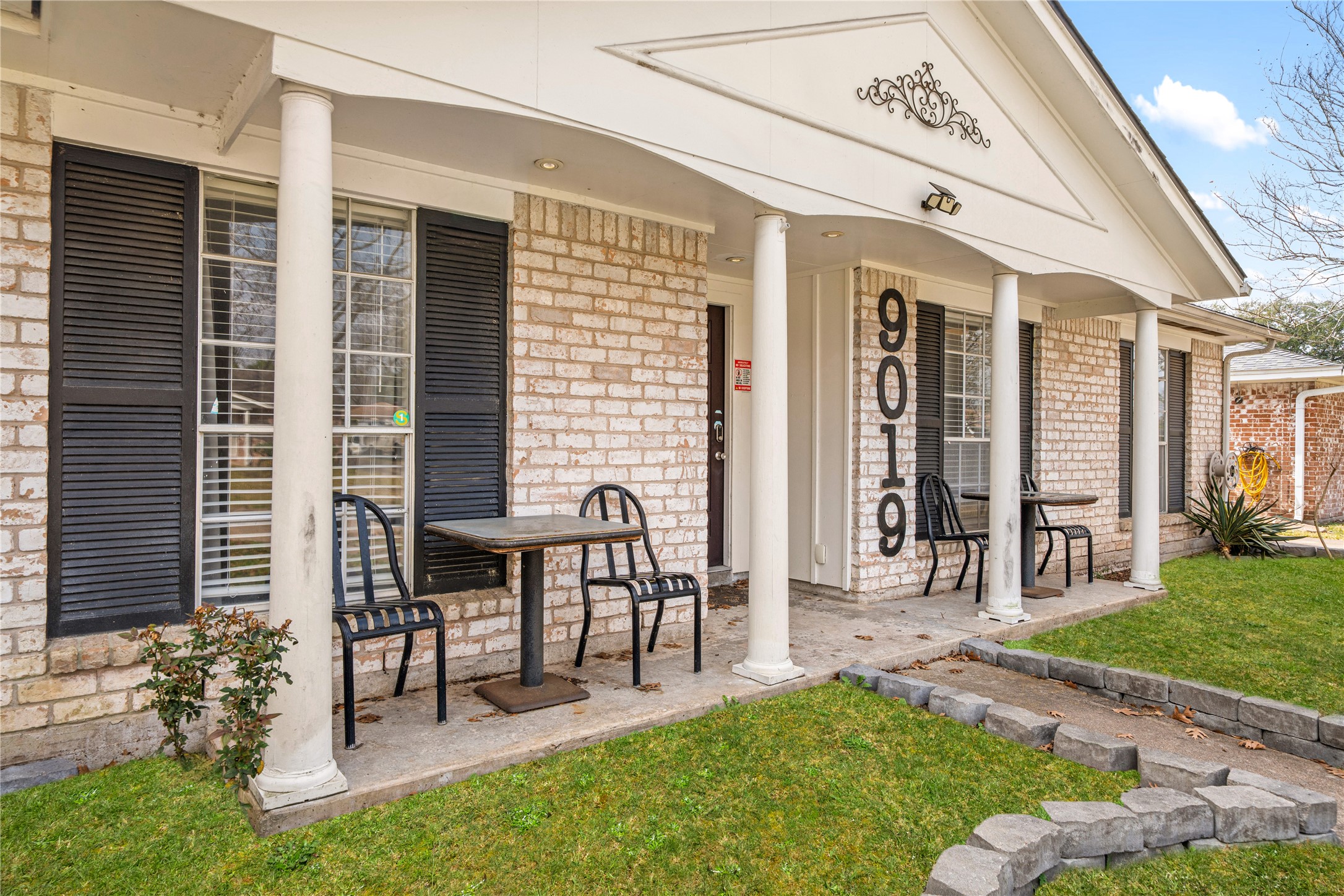 9019 Grape Street Houston, TX 77036 - Photo 3 of 24 a view of a house with backyard porch and sitting area