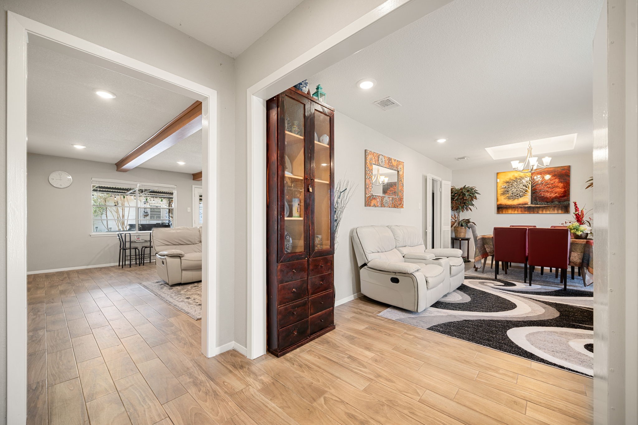 9019 Grape Street Houston, TX 77036 - Photo 4 of 24 a living room with furniture and a wooden floor