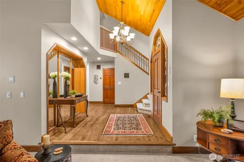 a view of living room filled with furniture and rug