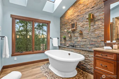 a bathroom with a sink and a large mirror