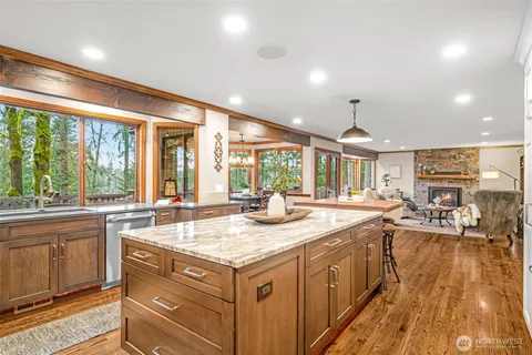 a kitchen with a stove and a sink