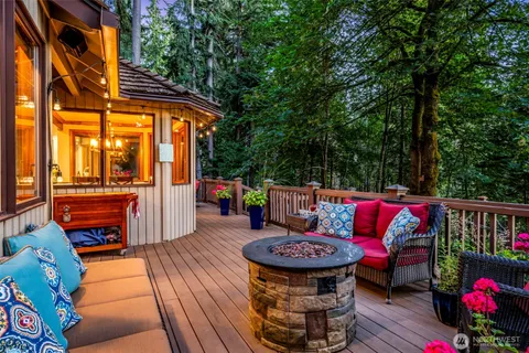 a wooden bench sitting in front of a building