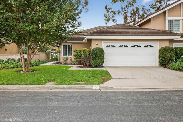 front view of house with a yard