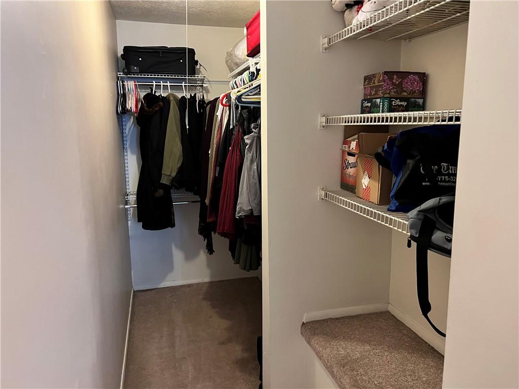 320 Celestial Drive Freedom, PA 15042 - Photo 11 of 25 a view of walk in closet with clothes and shoes