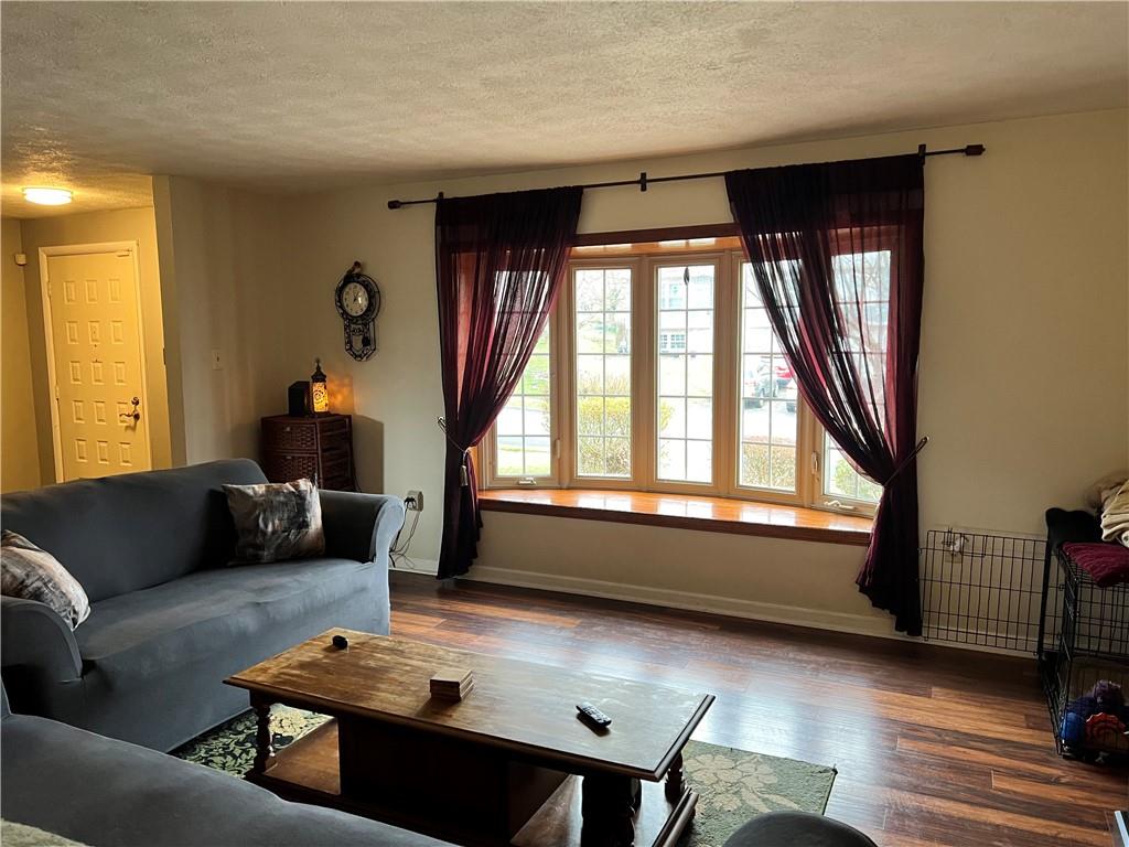 320 Celestial Drive Freedom, PA 15042 - Photo 2 of 25 a living room with furniture and a window