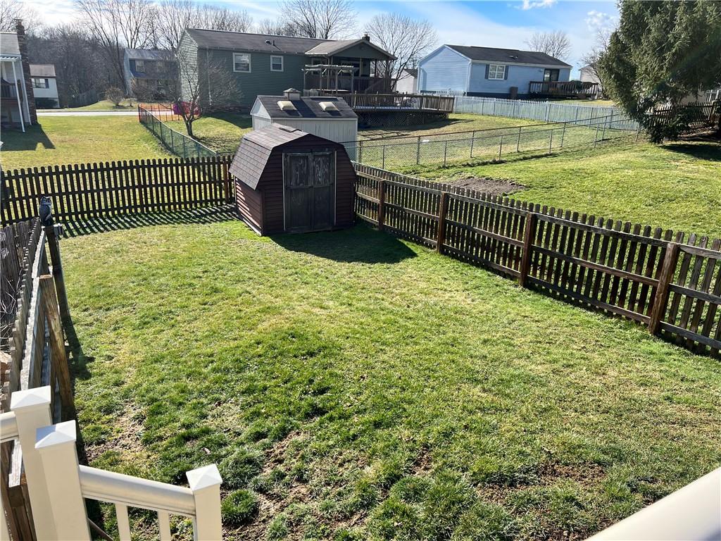 320 Celestial Drive Freedom, PA 15042 - Photo 23 of 25 a view of a swimming pool with a patio and a yard