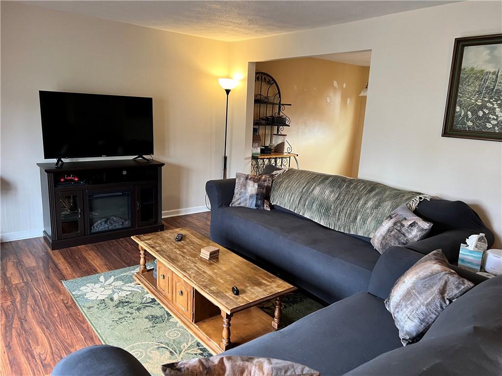 320 Celestial Drive Freedom, PA 15042 - Photo 3 of 25 a living room with furniture and a flat screen tv