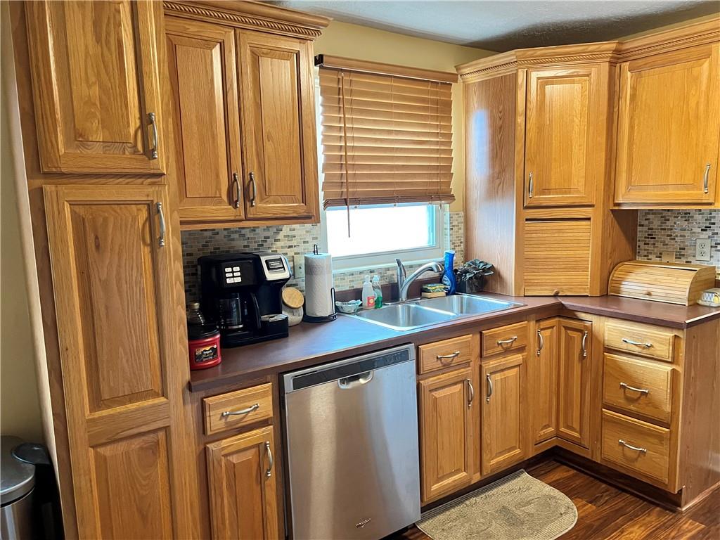 320 Celestial Drive Freedom, PA 15042 - Photo 5 of 25 a kitchen with stainless steel appliances a sink and cabinets