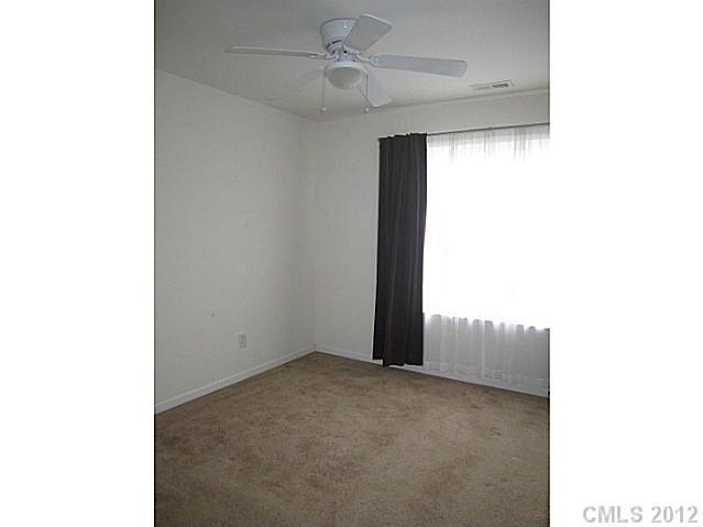 4908 Elizabeth Road Charlotte, NC 28269 - Photo 11 of 16 a view of an empty room