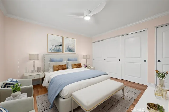 a bedroom with a bed and a couch