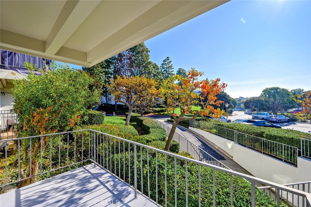 300 Cagney Lane, Unit 102 Newport Beach, CA 92663 - Photo 17 of 28 a view of a balcony