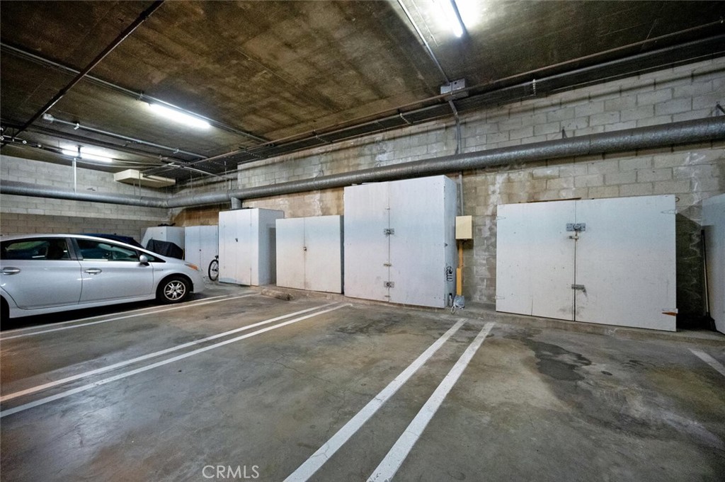 300 Cagney Lane, Unit 102 Newport Beach, CA 92663 - Photo 21 of 28 a view of parking garage