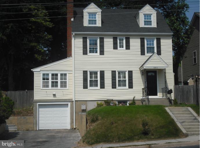 10812 Newport Mill Road Kensington, MD 20895 - Photo 24 of 24 a front view of a house with garden