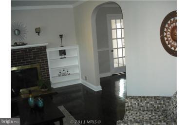 10812 Newport Mill Road Kensington, MD 20895 - Photo 6 of 24 a view of a hallway with windows