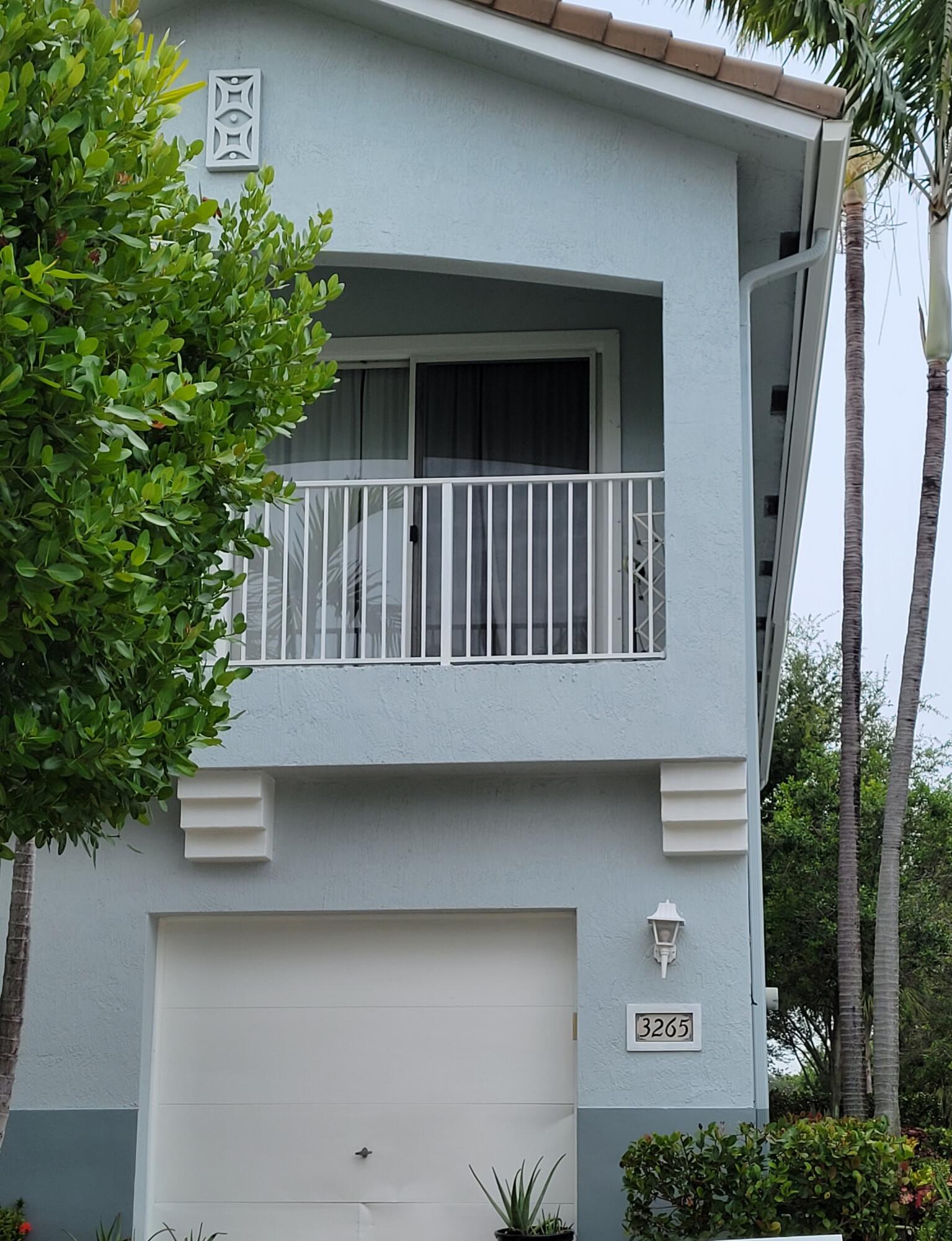 3265 Laurel Ridge Circle Riviera Beach, FL 33404 - Photo 1 of 7 THOUSAND OAKS FRONT