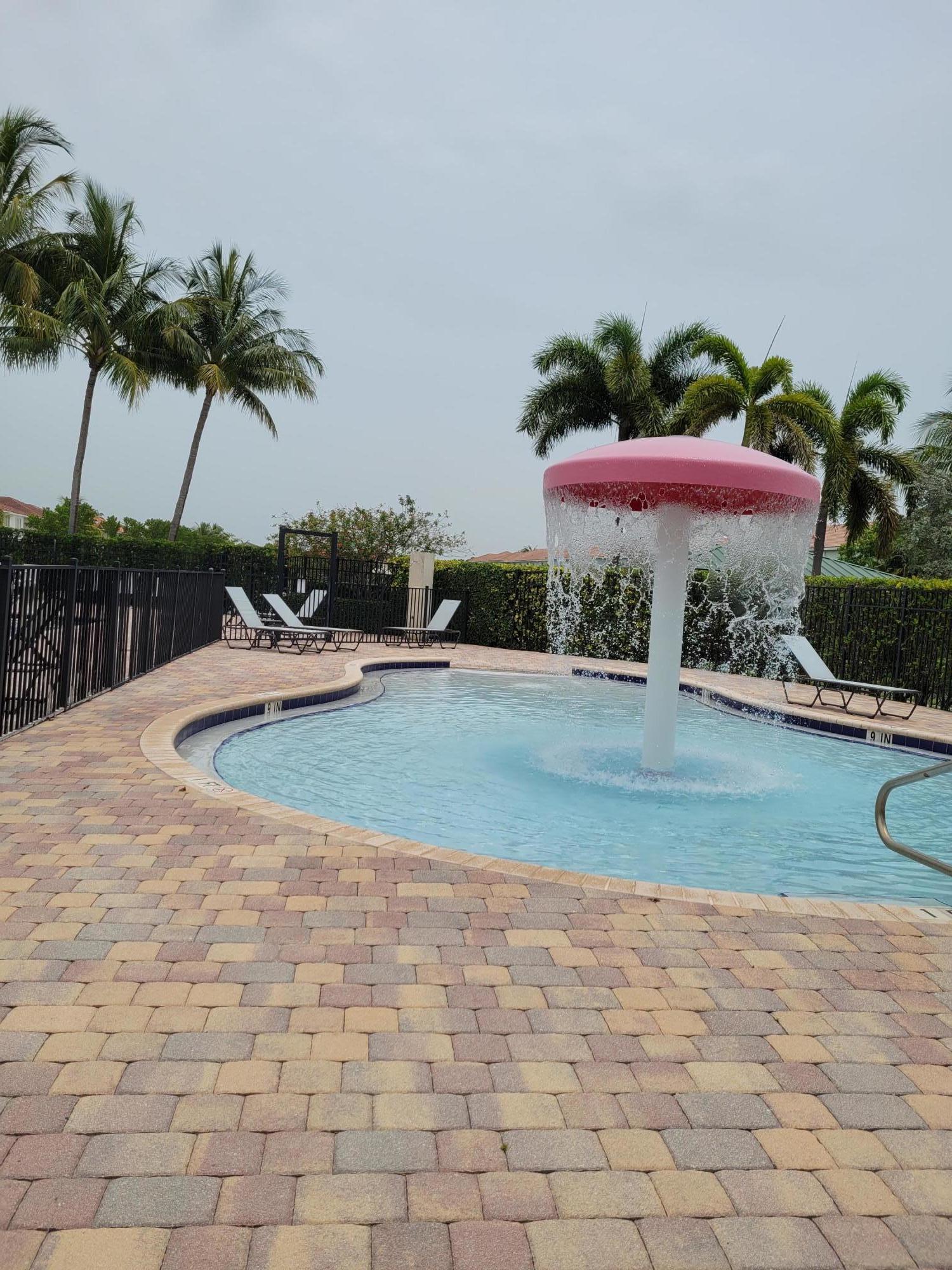 3265 Laurel Ridge Circle Riviera Beach, FL 33404 - Photo 4 of 7 TO KIDS POOL