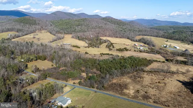 a view of a house with a mountain