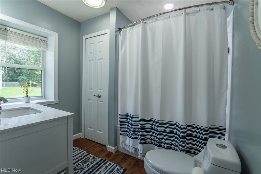 4168 Beckley Road Stow, OH 44224 - Photo 18 of 19 Bathroom with hardwood floors and vanity