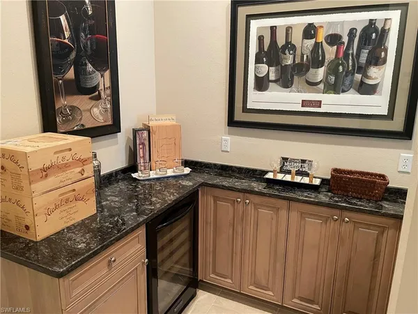 a kitchen with stainless steel appliances granite countertop a stove and a microwave