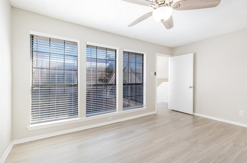 18240 Midway Road, Unit 204 Dallas, TX 75287 - Photo 19 of 21 a view of an empty room with a window