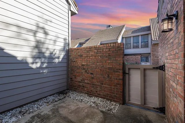 a view of a brick building with an empty space