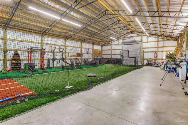 a view of yard with patio