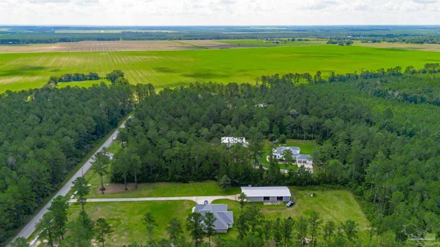 a view of a field with an outdoor space