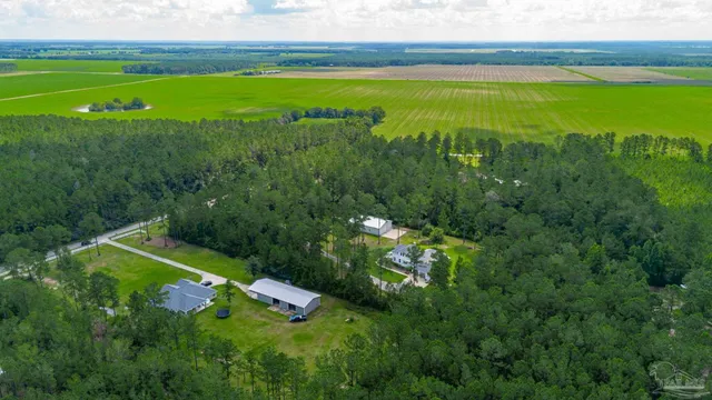 a view of a golf course with a lake view