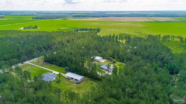 a view of a golf course with a lake view
