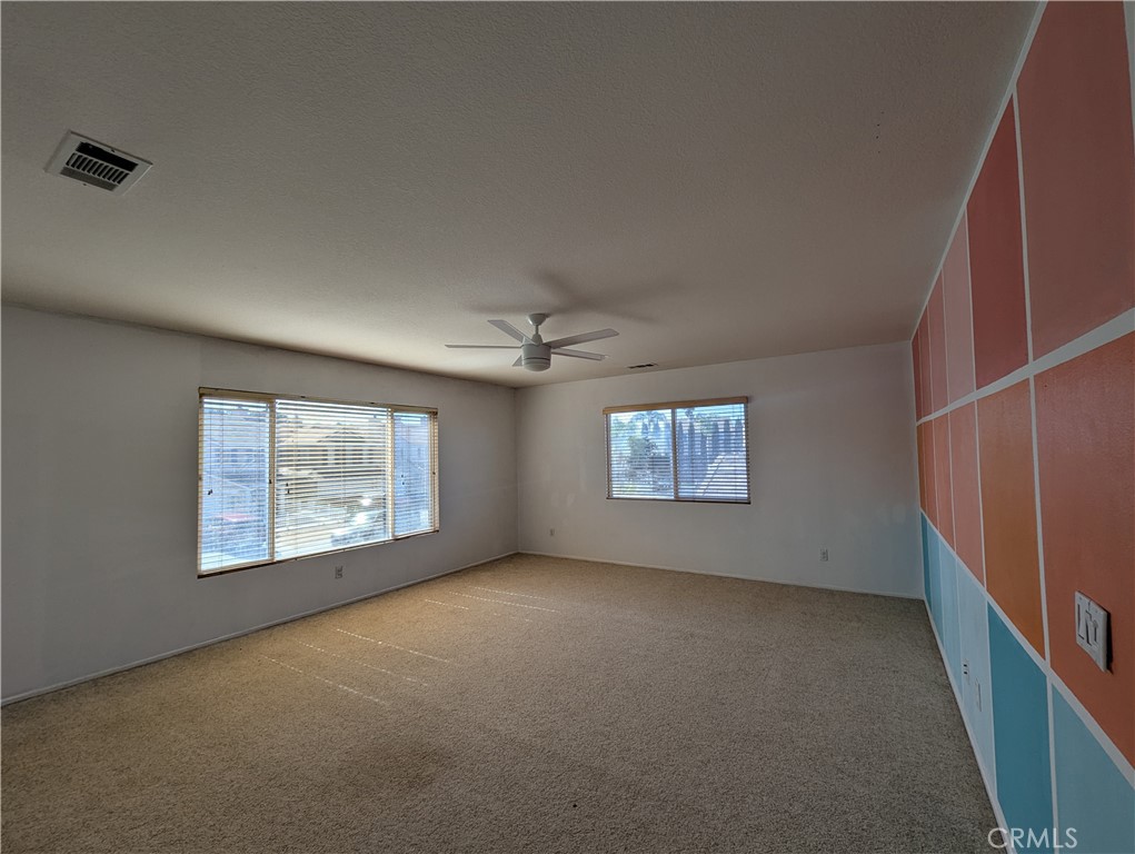 44601 Crestwood Circle Temecula, CA 92592 - Photo 19 of 46 an empty room with windows and closet