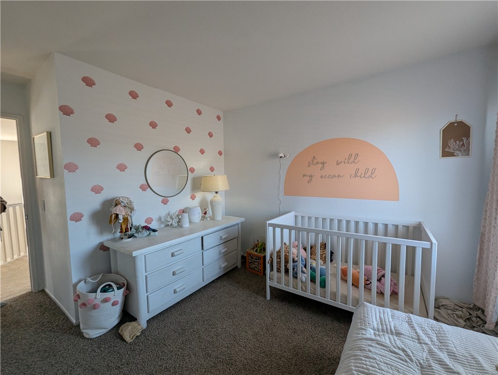 44601 Crestwood Circle Temecula, CA 92592 - Photo 23 of 46 a bedroom with a bed and wooden floor