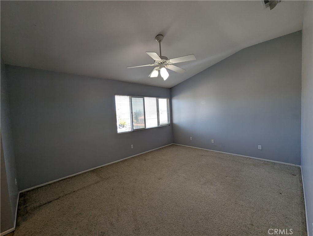 44601 Crestwood Circle Temecula, CA 92592 - Photo 27 of 46 an empty room with windows and fan
