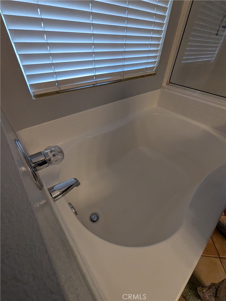 44601 Crestwood Circle Temecula, CA 92592 - Photo 29 of 46 a bathroom with a bathtub