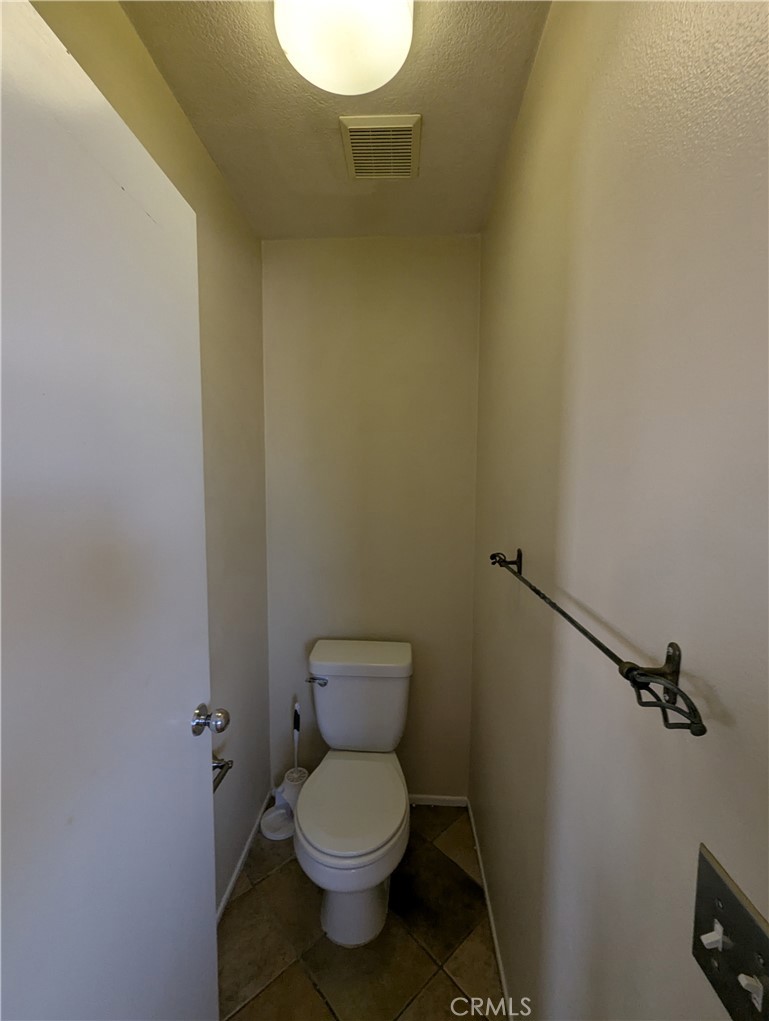 44601 Crestwood Circle Temecula, CA 92592 - Photo 30 of 46 a bathroom with a toilet