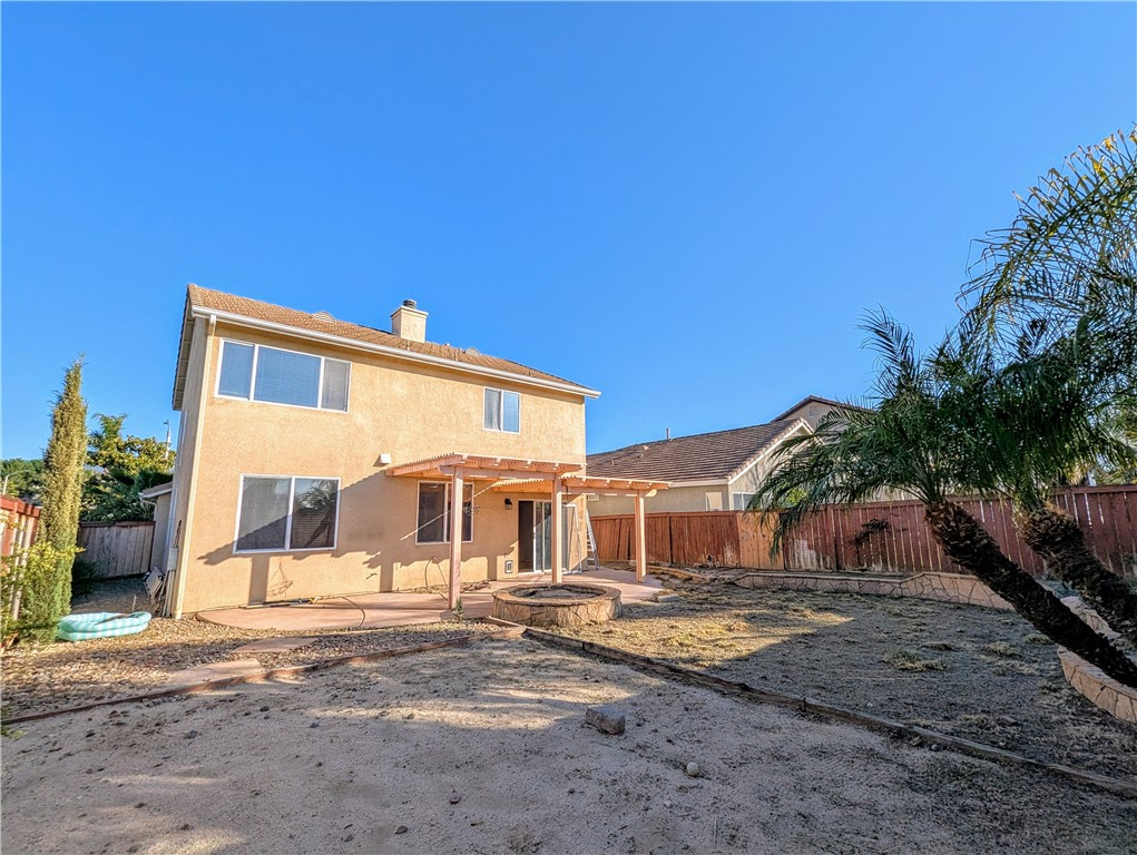 44601 Crestwood Circle Temecula, CA 92592 - Photo 41 of 46 a front view of a house with a yard and garage