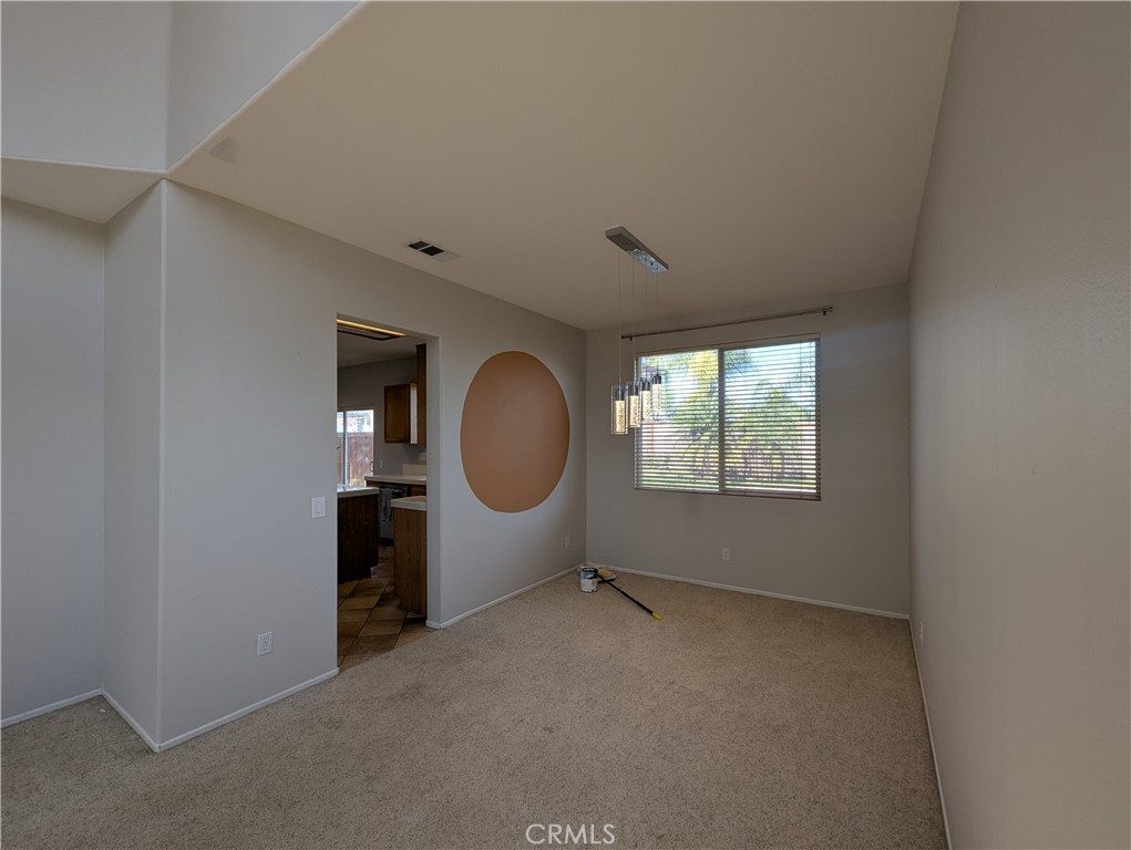 44601 Crestwood Circle Temecula, CA 92592 - Photo 8 of 46 an empty room with windows